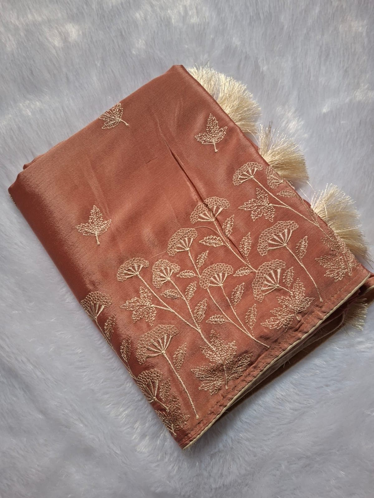Peach Thread Embroidery Saree with Tassels — folded