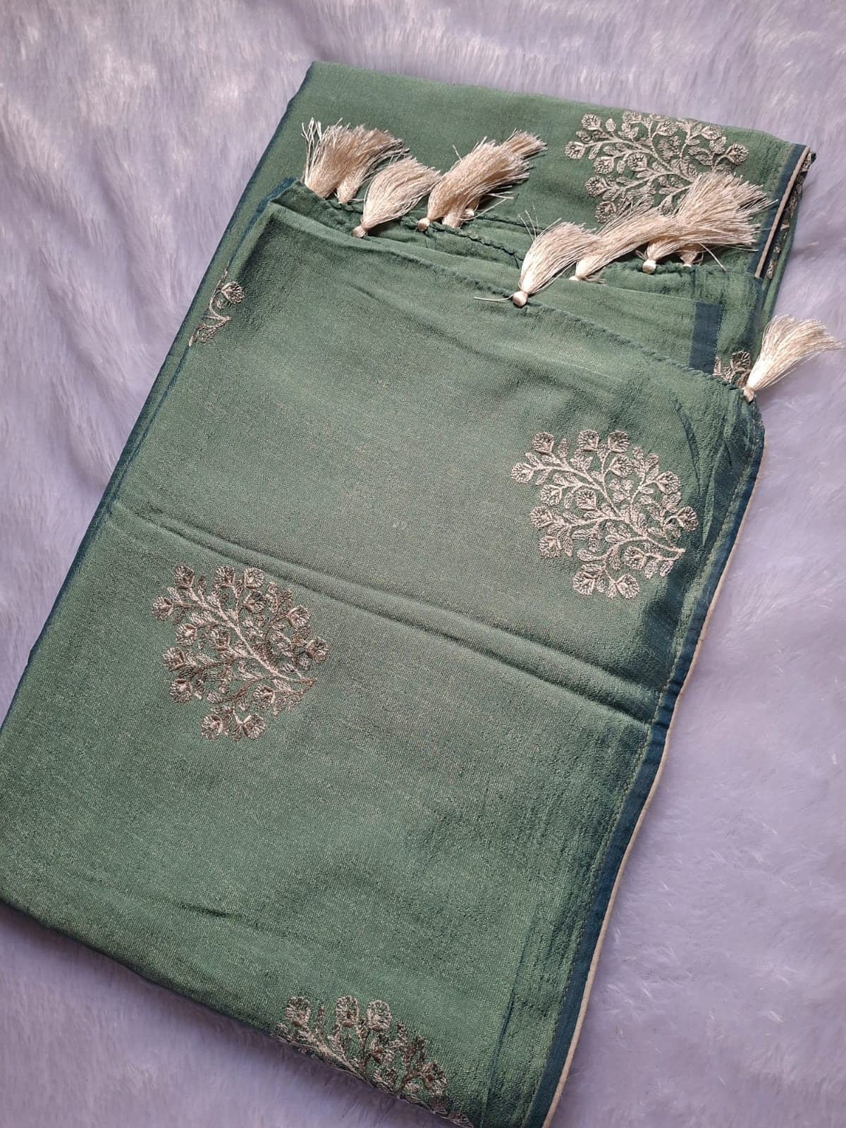 Sage Green Thread Embroidery Saree with Tassels — folded