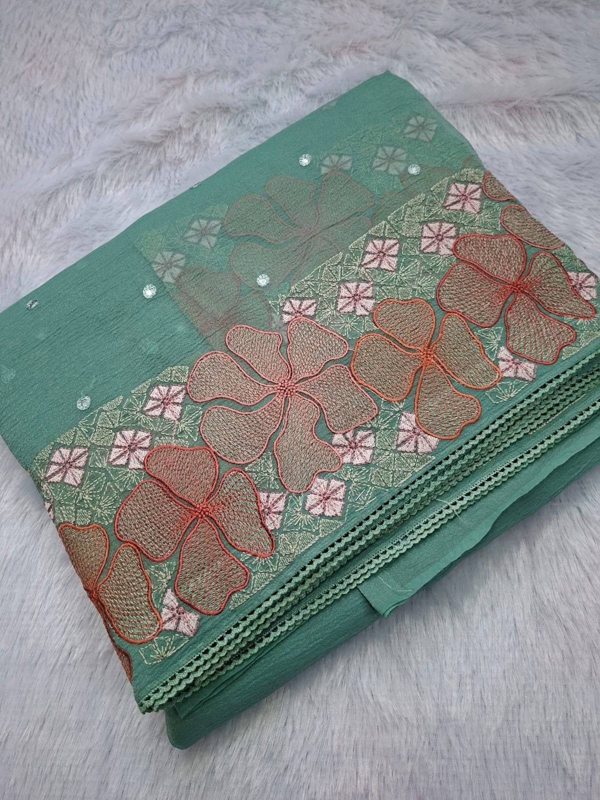 Sea Green premium windy crush saree, folded