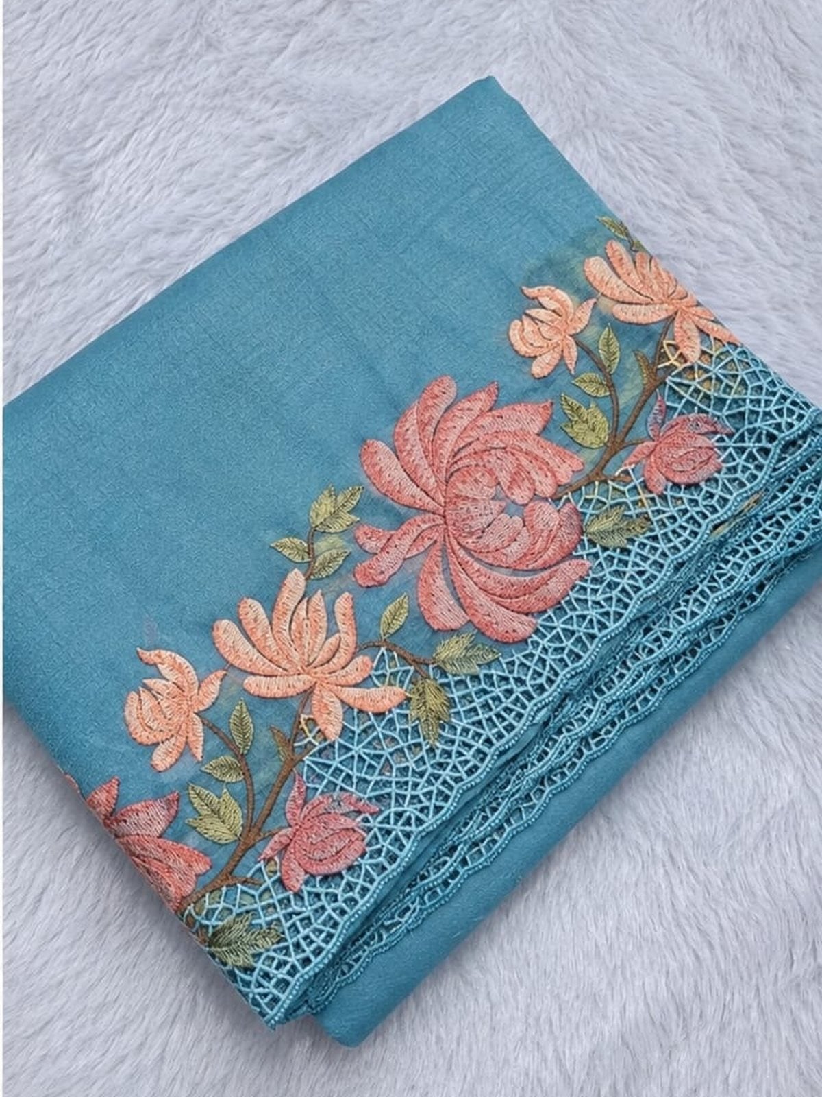 Sky Blue windy crush saree with rose embroidery, folded