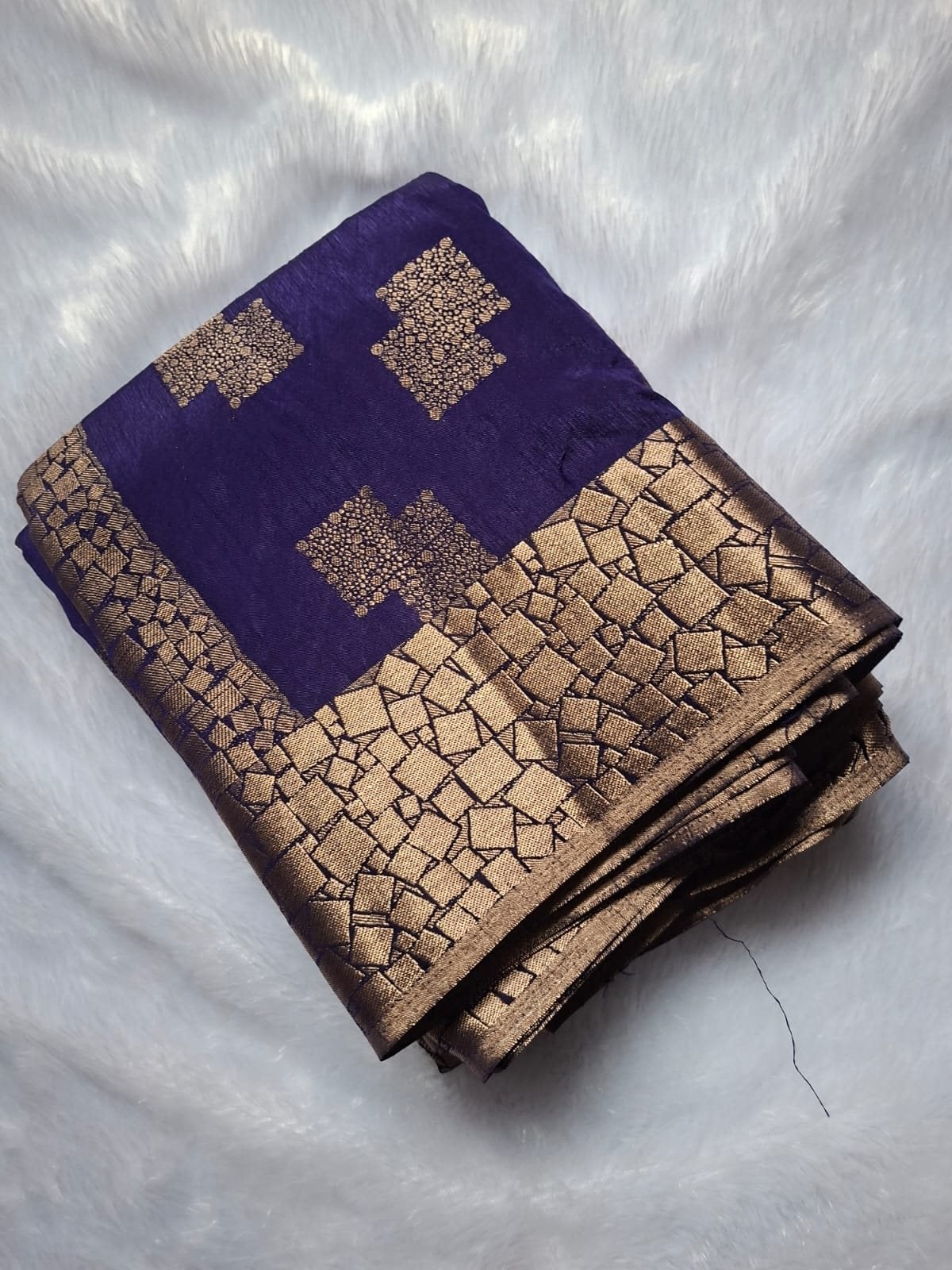 Indigo semi silk saree, folded
