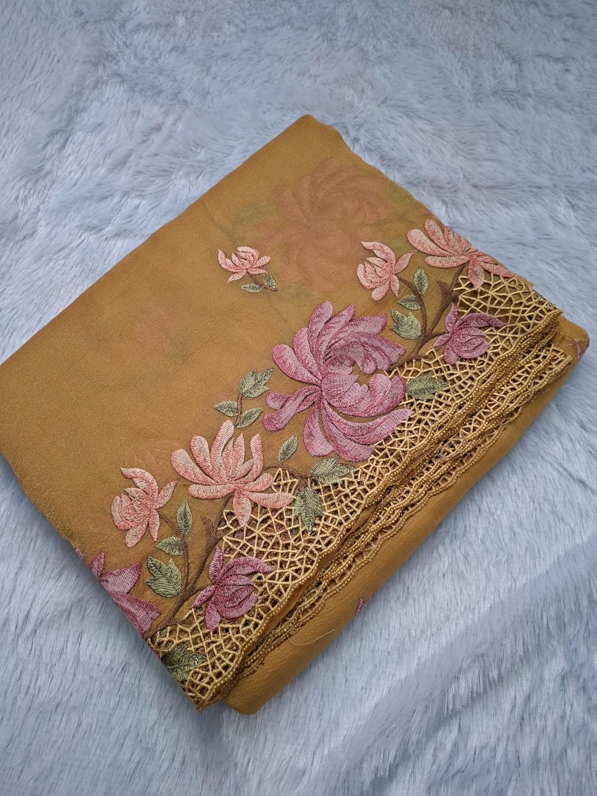 Mustard windy crush saree with rose embroidery, folded