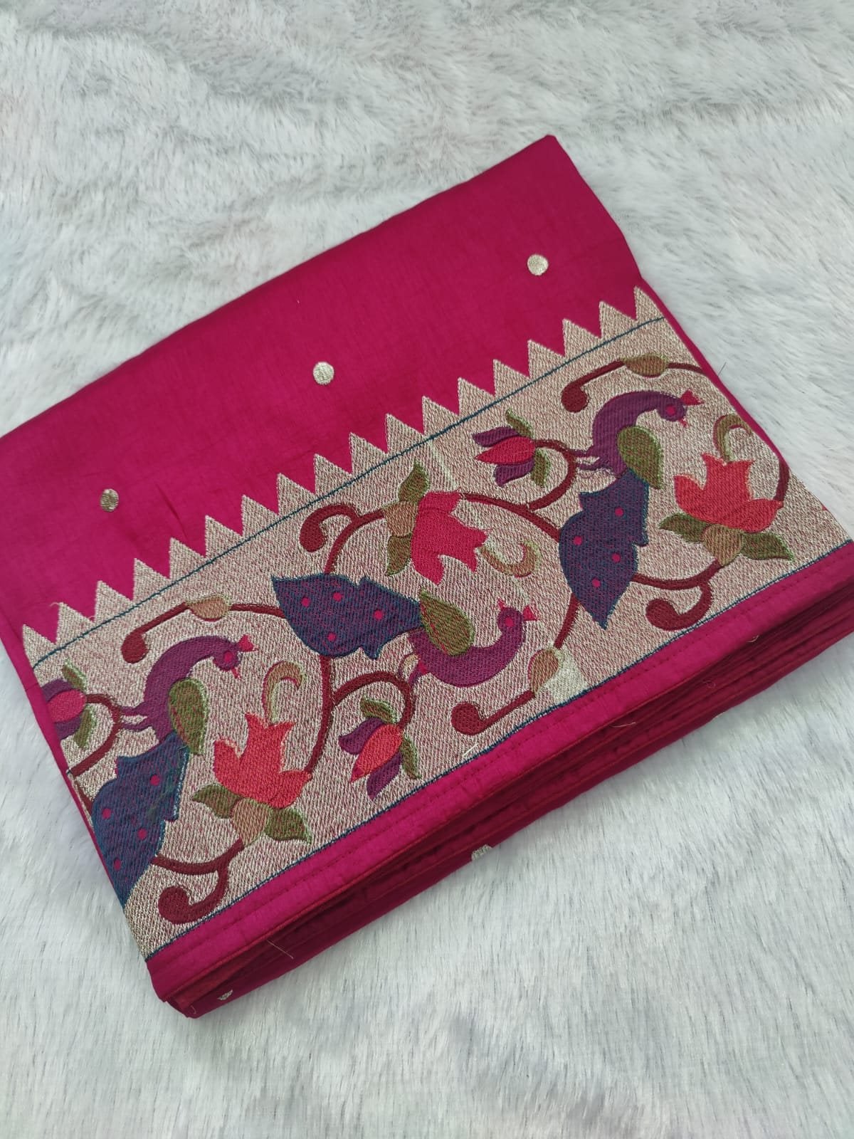 Rani pink raw silk saree with German silver Paithani border, folded